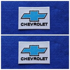 A Pair Of Motor Car Racing