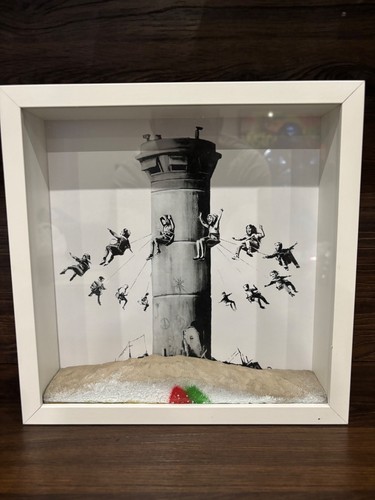 Banksy box walled off - box,