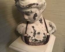 Multi strand and coloured metal chain short necklace with crystal barrel detail.