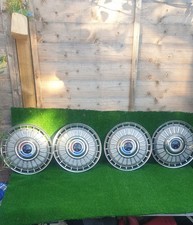 SET OF 4 FORD/ZEPHYR/CORSAIR/ZODIAC CORTINA STAINLESS STEEL HUB CABS 13".