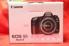 canon 5d mk ii body, CF card, extra Battery and usual box contents