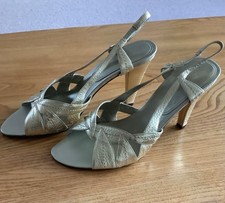 New Unworn Gold Sandals Size