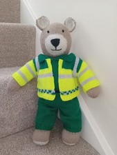 new hand knitted teddy bear in