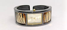 A Lovely ETON Ladies Black with Tiger Stripes Hinged Bangle Dress Watch WORKING