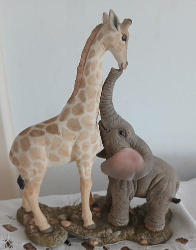 Tuskers giraffe and - giraffe, elephant