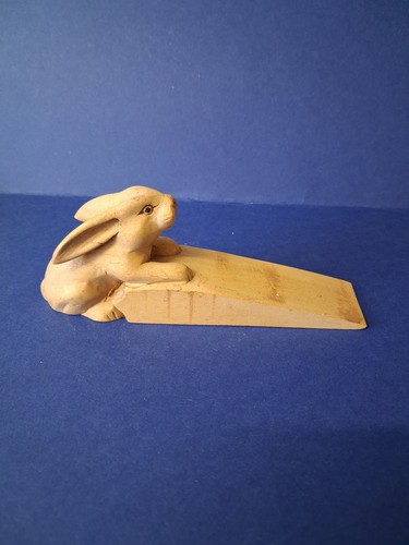 Carved rabbit wooden door stop - door,