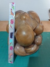 Large heavy wooden buddha in