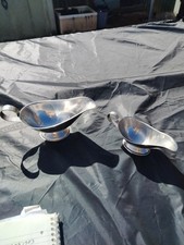 TWO METAL JUGS