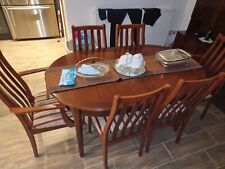 extending mahogany Oval dining