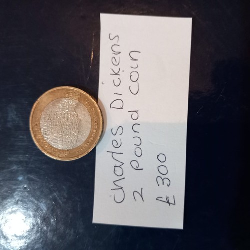 Charles dickens coin - charles,