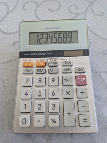 Sharp calculator elsi - sharp, mate