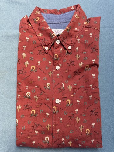 Next shirt with cowboy - next, wagon
