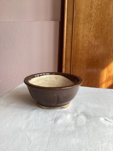 Small brown circular ceramic - small,