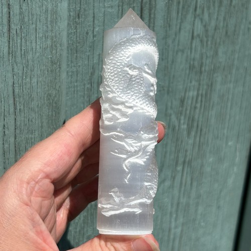 Selenite point with - selenite,