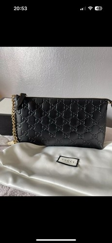 Gucci black embossed leather - black,