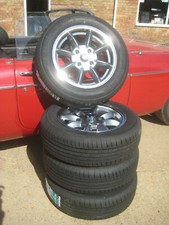 SET OF FOUR MGB ROADSTER BGT  5.5 X 15 GREY  POLISHED  RIM ALLOY WHEELS & TYRES