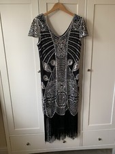  1920s inspired dress with gloves and headdress