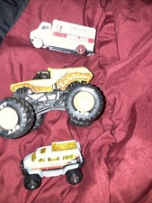 One Monster Truck And 2 Cars