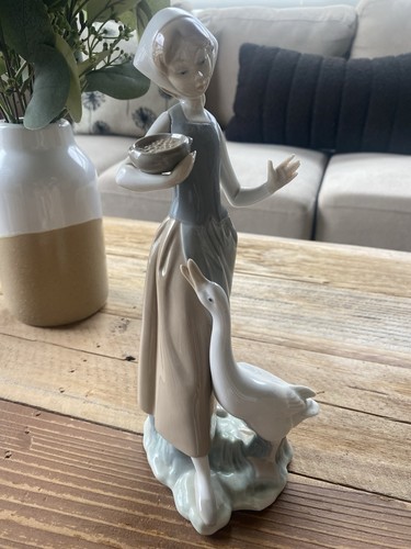 Lladro girl feeding goose - girl,