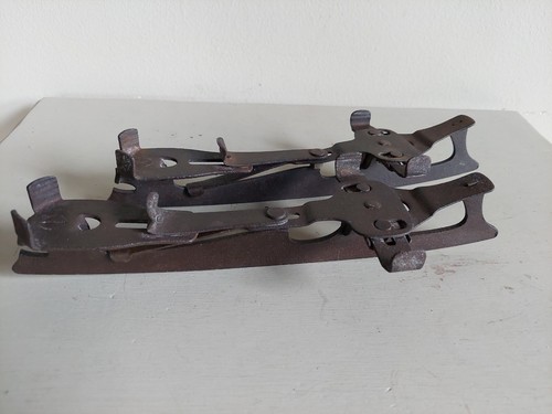 Vintage metal ice - skates, pair