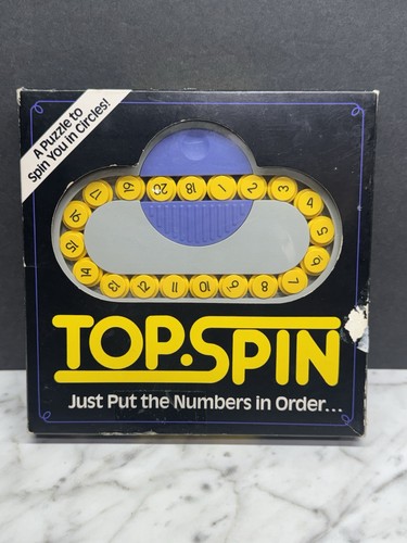 Top spin puzzle - top, teaser