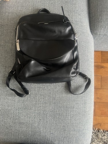 Black leather tumi backpack - black,