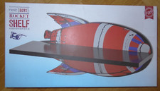 Next boys rocket shelf h-20 x w-40 x d-16cm red blue grey rocket with black shel