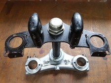 BMW R80ST Fork yokes complete. Very good condition. Headlamp brkts not included.