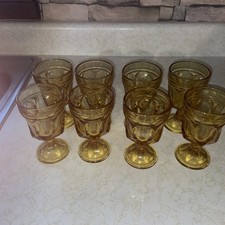 8 Small , Gold Colored Stem