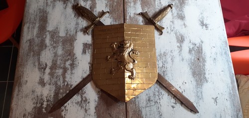 Vintage brass coloured shield - coloured,