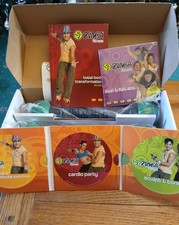 Zumba Fitness Kit Toning Sticks with Workouts, 4 DVDs, Guide Book. Unused.