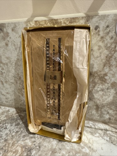 Gold plated phone - plated, book
