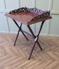 A Decoratively Carved Butlers Table, Tray on Stand