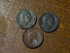 3 low grade British farthings
