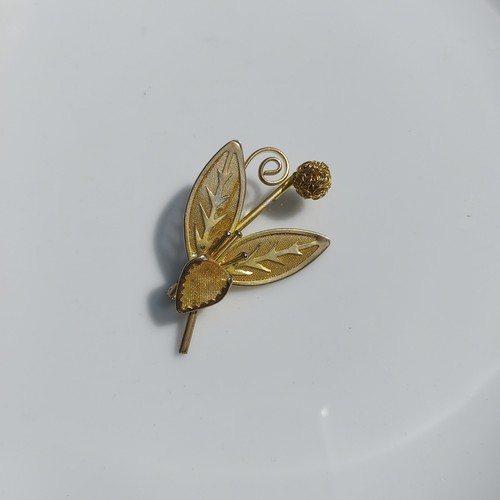 Gold tone small flower - small,
