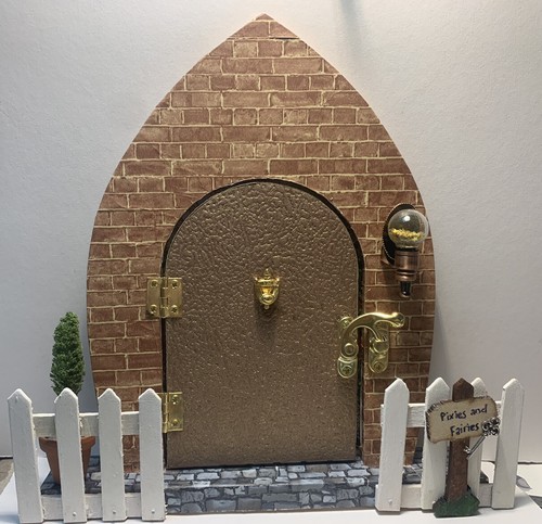 Wooden fairy door with opening