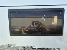 elddis caravan window/ compass