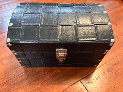 Wood chest with rivets holding