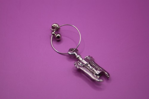 Really old corkscrew charm - a,