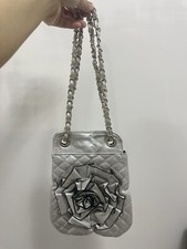 Silver quilted leather flower
