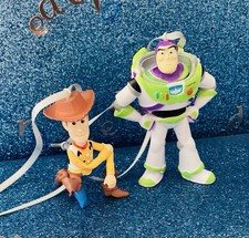 SET OF 2 TREE DECORTAIONS FROM TOY STORY BUZZ AND WOODY