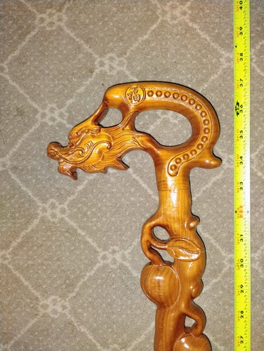 Carved brown wooden dragon - carved,