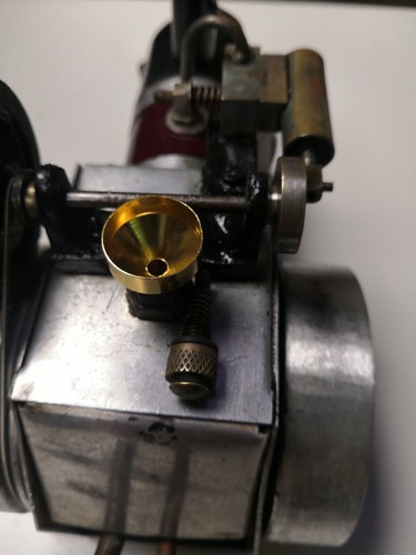 18mm dia brass - like, metal