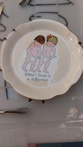 Vintage ceramic dish features