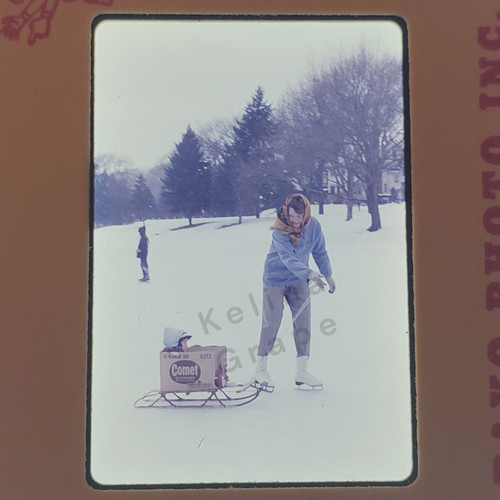 1962 mom pulling son sleigh - pulling, on