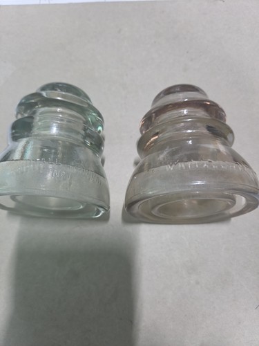 Two glass insulators - glass, clear