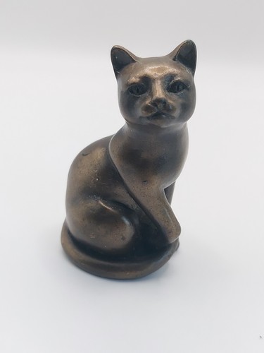 Bronze tone sitting - sitting, cat