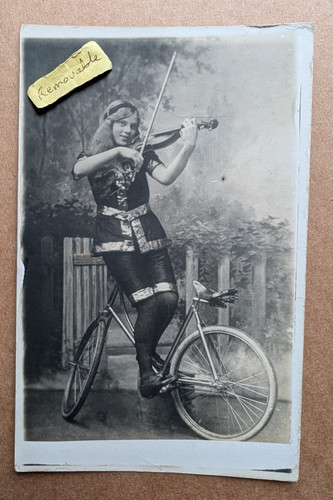 Unusual old photo girl playing - photo,