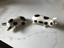 A PAIR OF CHINA PIGS (one