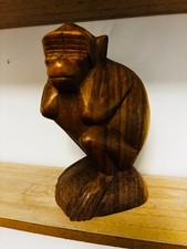 Wood Carved sculpture of one
